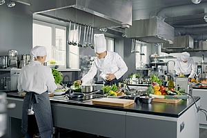 a restaurant kitchen that has equipment covered by restaurant insurance